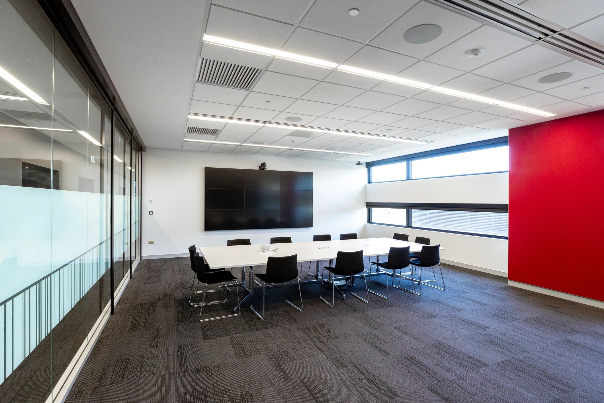 Modern conference room with interactive information wall