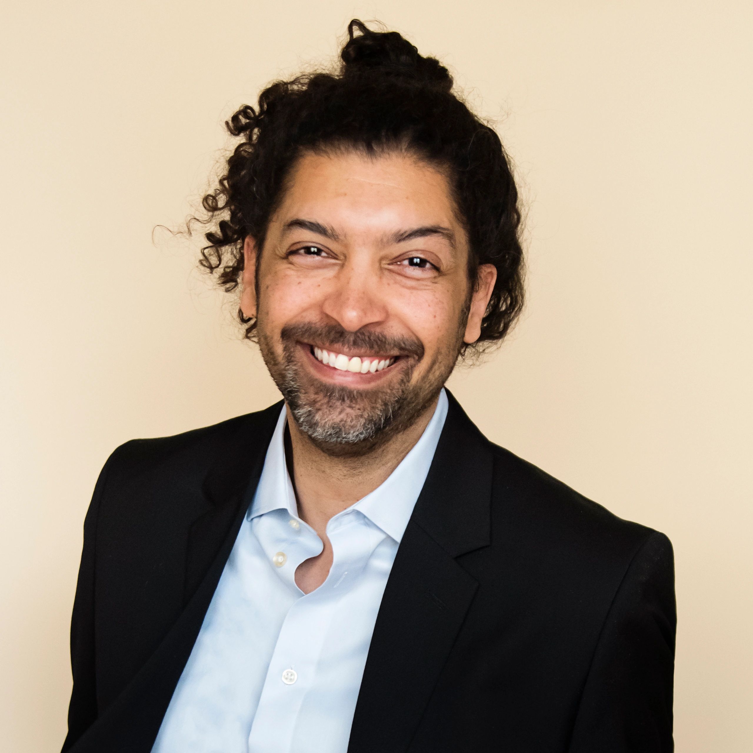 Professional headshot of an executive